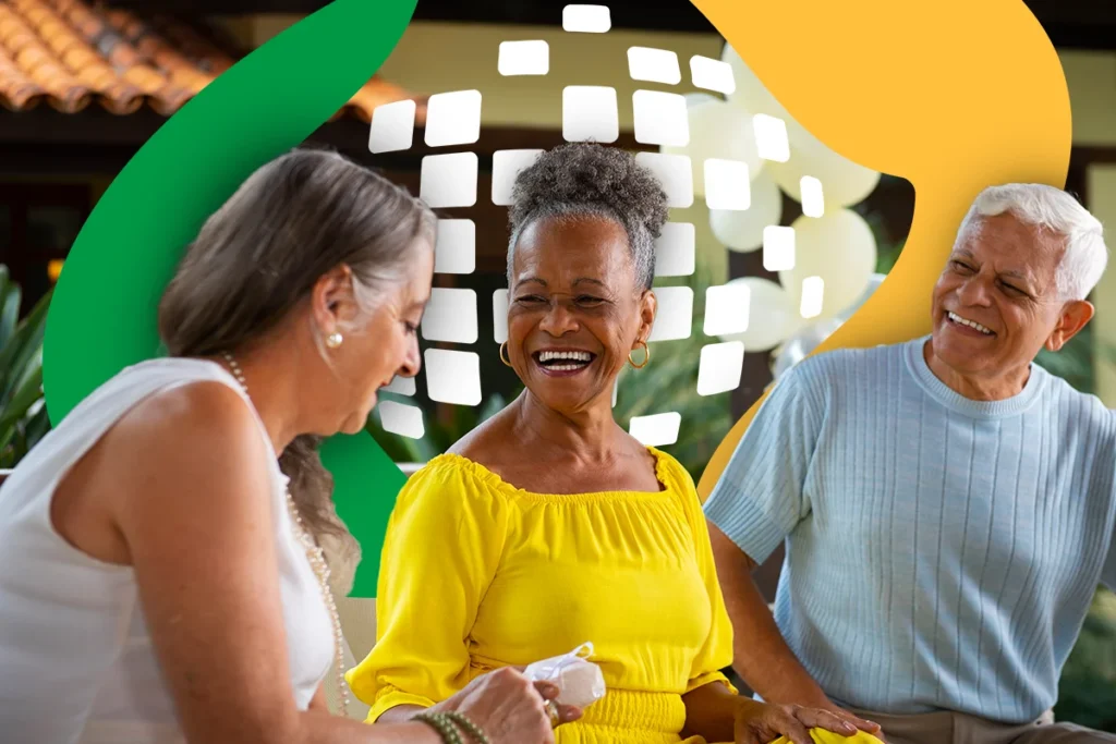 Imagem de idosos sorrindo e interagindo, destacando a importância dos serviços do INSS para garantir benefícios aos segurados.