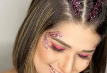 Mulher com cabelo curto e estiloso, com tranças e glitter no rosto, ideal para o Carnaval.