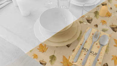 Caminho de mesa estampado com folhas de outono e bolotas, decorando uma mesa elegante.