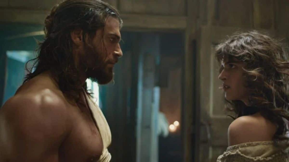 Protagonistas de El Turco em momento tenso, com o homem e a mulher se encarando intensamente em uma cena cheia de emoção.