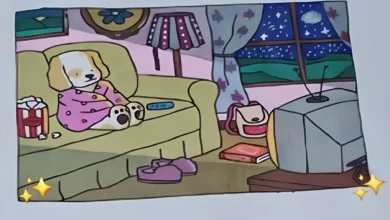 Bobbie Goods assistindo TV com efeito de tela ligada, em um sofá, com pipoca e ambiente aconchegante