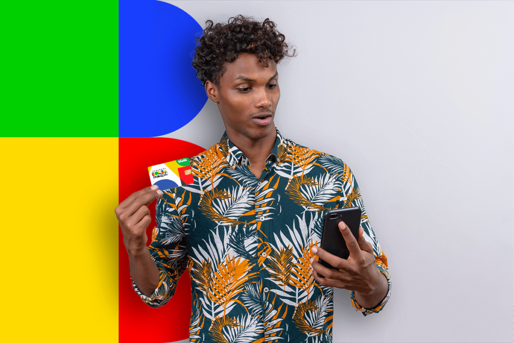 Jovem segurando cartão do Bolsa Família e olhando para o celular com expressão de surpresa