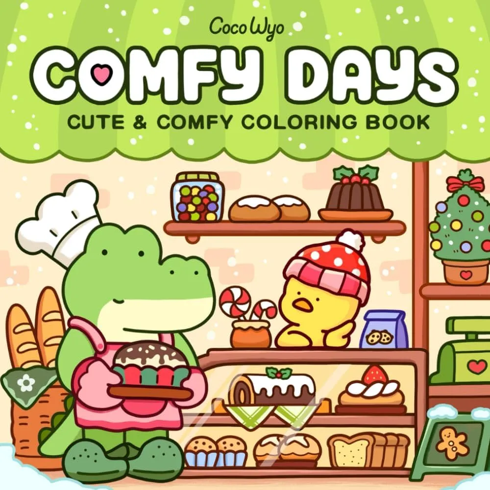 Livro de colorir "Comfy Days" com ilustração fofa de um jacaré confeiteiro e um passarinho usando touca, cercados por pães e doces