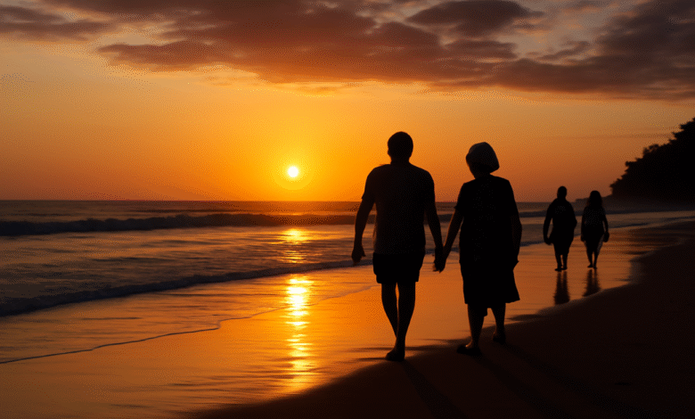 Imagem de uma praia tranquila com pessoas caminhando calmamente no pôr do sol