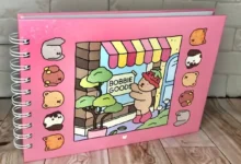 Caderno ilustrado da Bobbie Goods com capa rosa e desenhos de bichinhos fofos