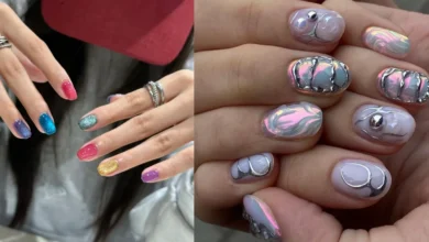 Unhas decoradas coreanas com brilho e elementos metálicos modernos.