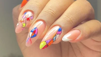 Unhas decoradas para o São João com designs coloridos e modernos inspirados nas bandeirinhas e elementos juninos.