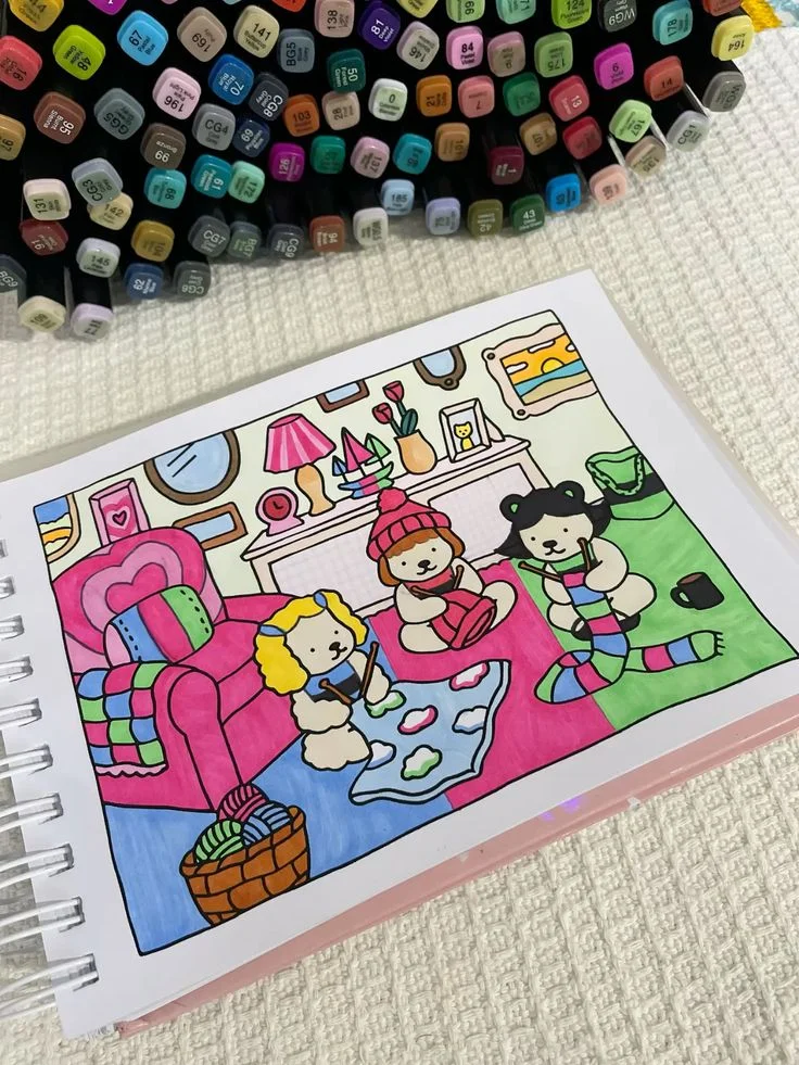 Página colorida de um livro Bobbie Goods mostrando personagens fofos e uma cena divertida com crianças e animais.