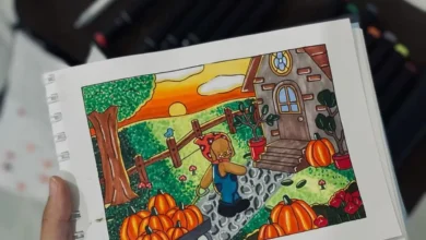 Desenho colorido de cenário com abóbora feito com canetinhas, ilustrando técnicas de pintura sem manchas.