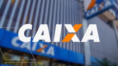 Imagem mostrando a fachada da Caixa Econômica Federal, com o logo visível, relacionada à liberação de empréstimo com imóvel como garantia.