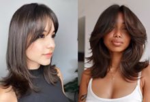 Corte médio com franja, um estilo moderno que traz frescor e leveza ao visual.