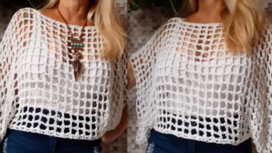 Blusa de crochê branca com padrão vazado, ideal para looks casuais e feitos à mão.