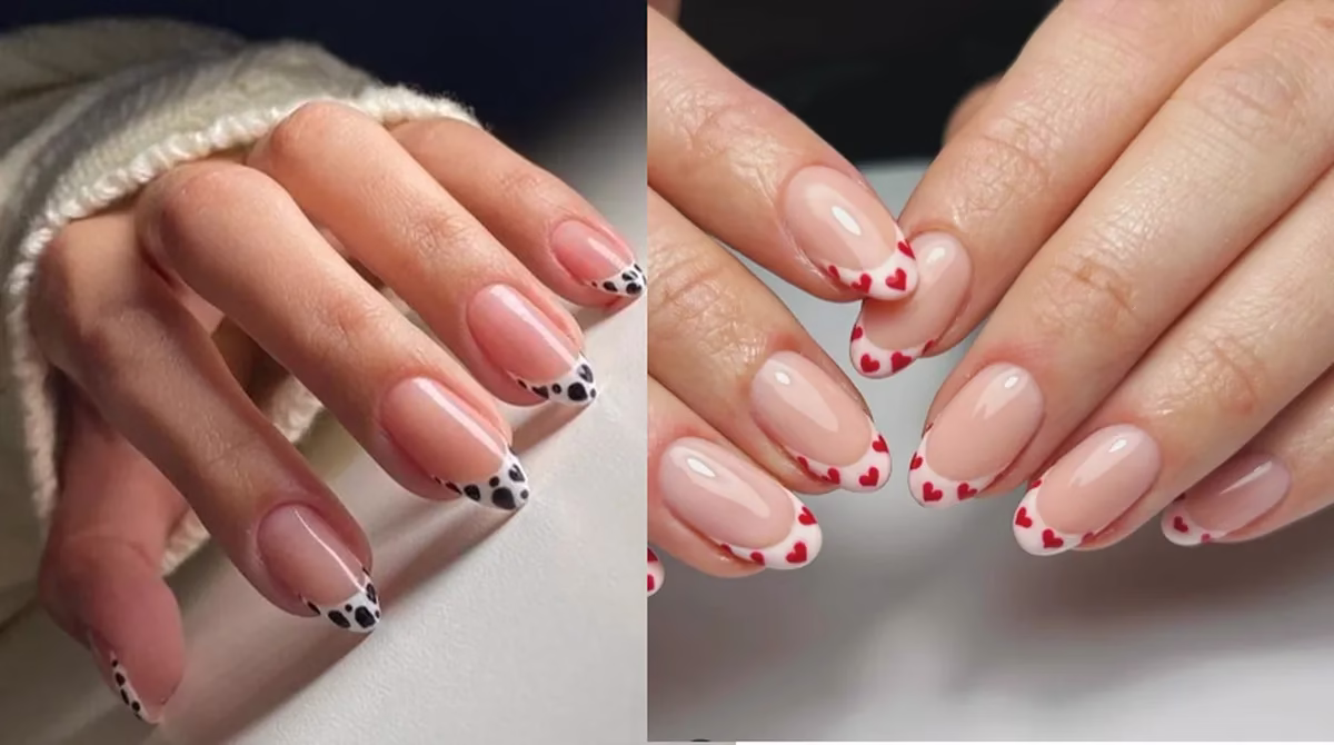 Unhas francesinhas modernas com designs criativos em preto e branco e corações vermelhos.